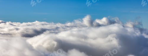 Preview: White Puff Clouds during a sunny day