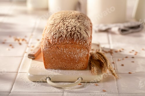 Preview: Small and fresh loaf of rye bread with barley.