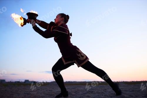 Preview: Female Fire Show Performer Dancing with Flaming Bowls