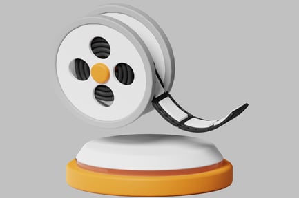 Preview: Circular device with four holes and a black cord.
