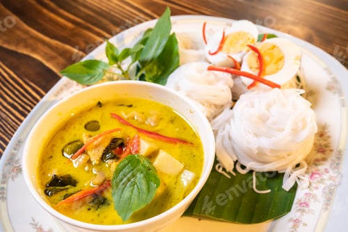 Preview: Thai style food, green curry with chicken, delicious vegetable Asian dinner
