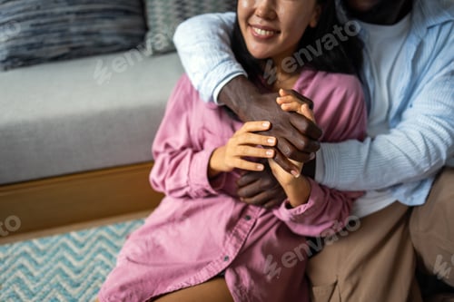 Preview: Happy multiethnic couple, love and hug laughing in joyful happiness for bonding time together