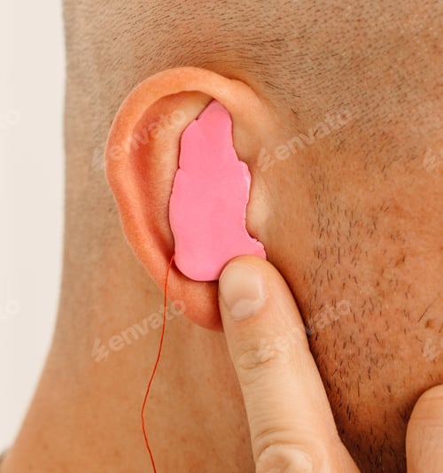 Preview: Process of making earplug from an impression of an individual s human ear. Ear close-up. Personally