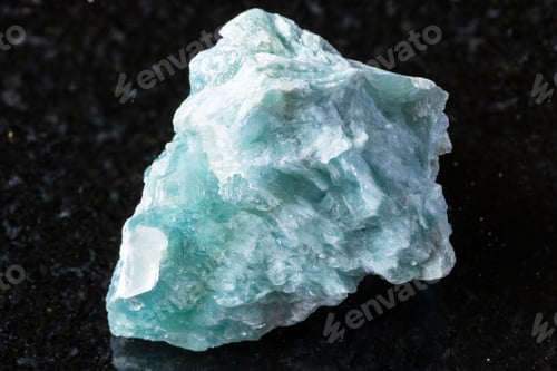 Preview: sample of rough brucite mineral on black granite