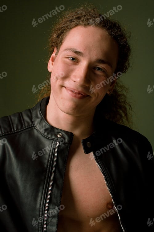 Preview: Attractive And Stylish Guy With Curly Hair And A Sports Figure