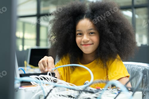 Preview: Children using the hand robot technology and having fun Learning