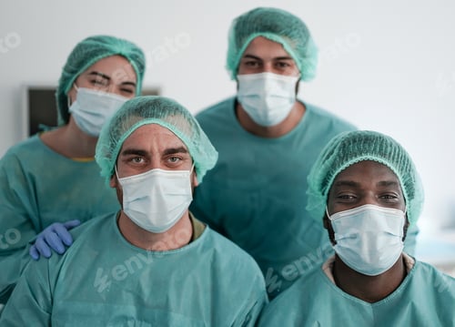 Preview: Medical workers looking on camera inside hospital lab