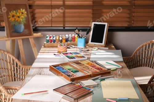Preview: Artist's workplace with soft pastels, tablet and drawing pencils on table