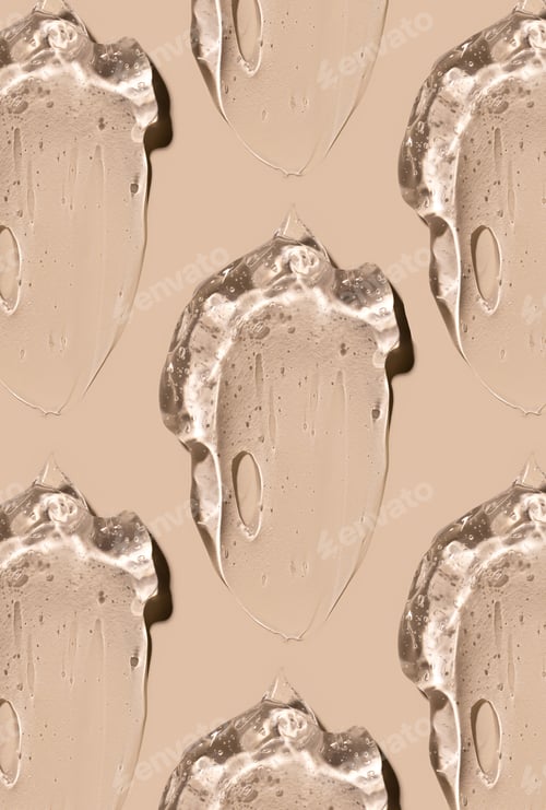 Preview: cosmetic texture gel essence smears on a beige background close-up
