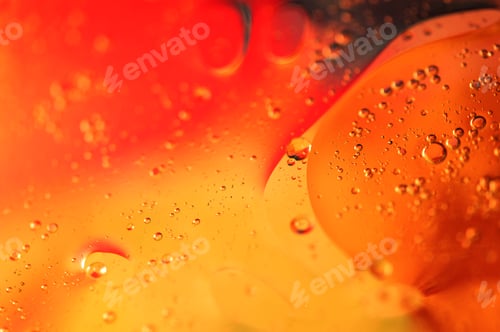 Preview: Oil in water, abstract background in yellow and red color tones