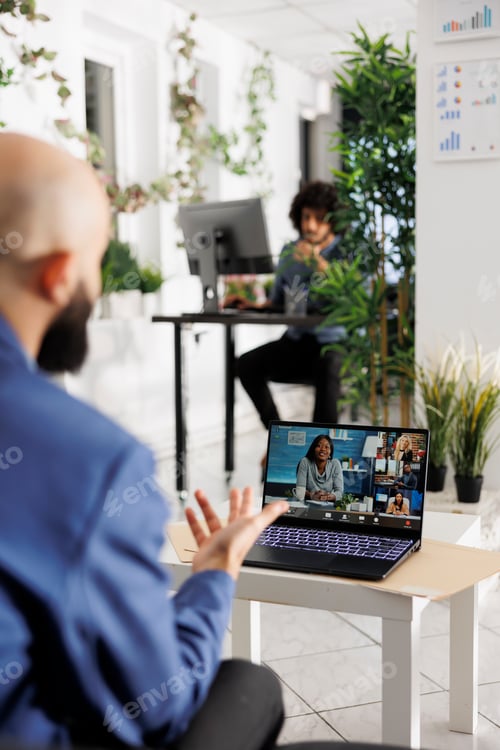 Preview: Executive in startup company leading virtual meeting