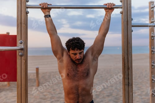 Preview: man pulling up on beach