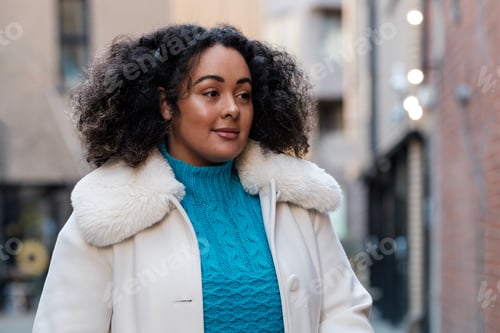 Preview: Portrait outdoor of curvy young woman.
