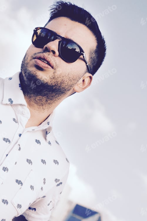 Preview: A young guy wearing sunglasses