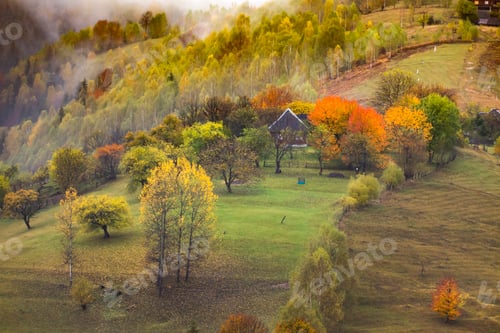 Preview: Moody autumn landscape in a rural Transylvanian village.