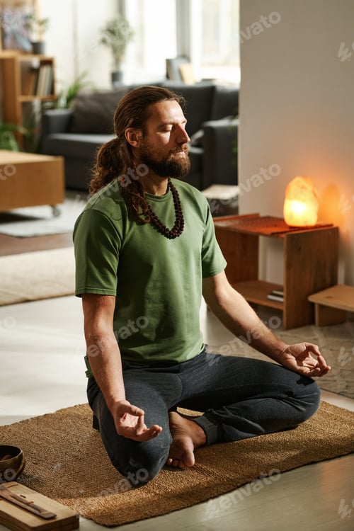 Preview: Man doing yoga at home