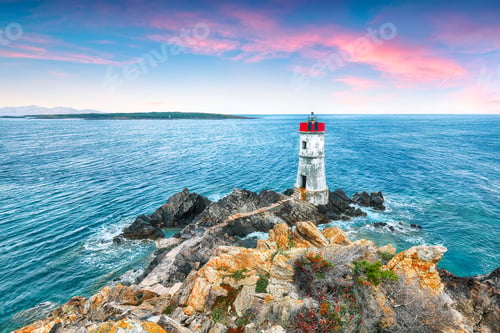 Preview: Fabulous view of sunrise over Capo Ferro Lighthouse.
