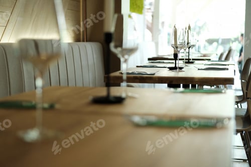 Preview: Empty wine glass on dining table in restaurant