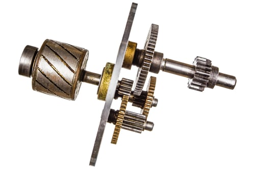 Preview: Gear wheels of reducer motor, isolated on white background