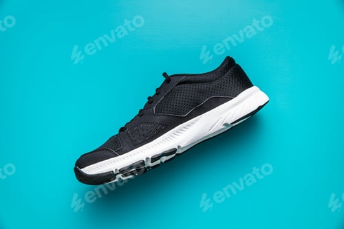 Preview: Black sport shoe.