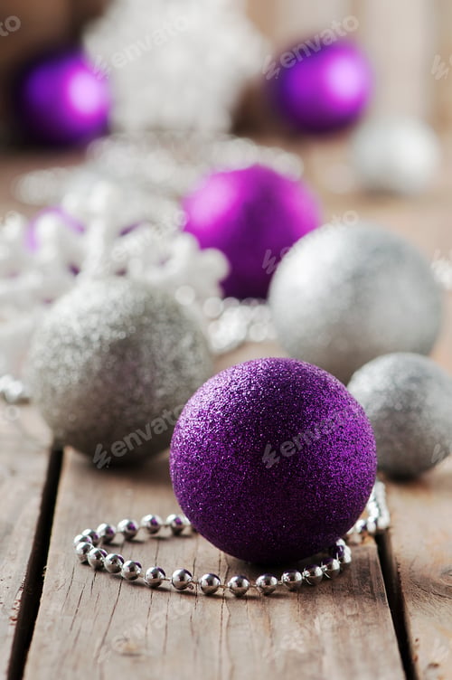 Preview: Christmas ornament with balls on the wooden table