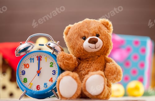 Preview: Alarm clock and teddy bear
