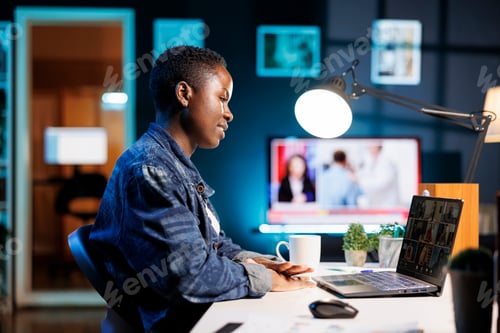 Preview: Woman having online meeting on laptop