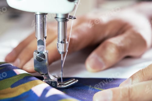 Preview: Seamstress Sewing Silk Dress