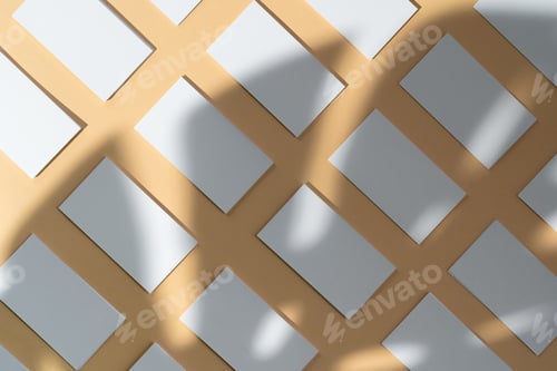 Preview: Creative photo with floral shadow of white businesscard on beige background