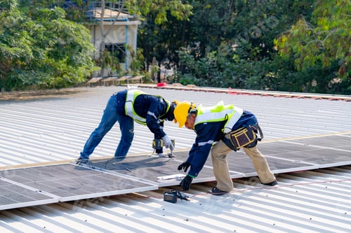 Preview: workers installing solar panels, for efficient energy on rooftop
