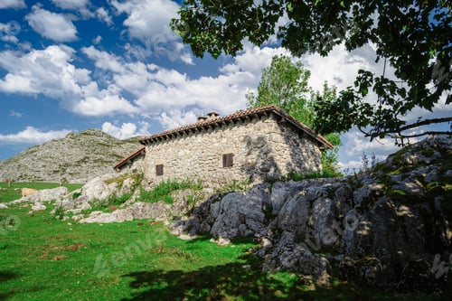 Preview: Beautiful, old stone house located in Asturias, Spain, surrounded by majestic mountains