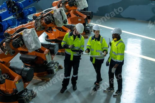 Preview: Engineer control robot the production of factory parts engine manufacturing industry robots.