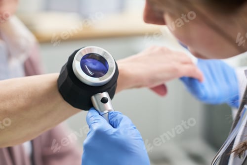 Preview: Adult Woman Undergoing Skin Examination by Dermatologist