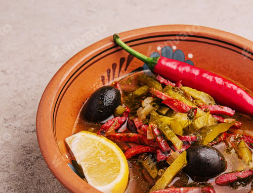 Preview: meat soup Solyanka in bowl close up