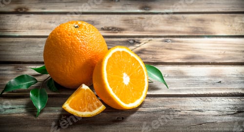 Preview: Fresh oranges with leaves.
