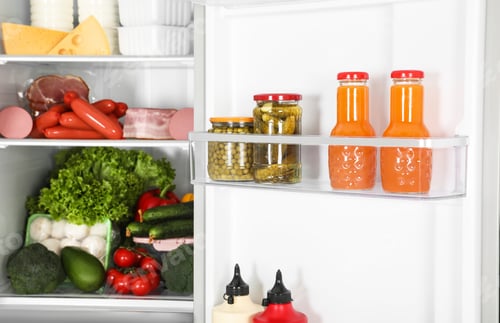 Preview: Open refrigerator full of different fresh products