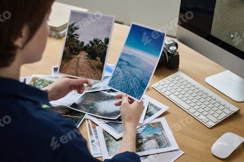 Preview: Graphic designer editing photo on computer