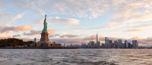 Preview: Statue of Liberty during a vibrant cloudy sunrise