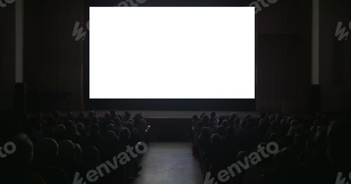 Preview: Viewers in dark cinema hall with blank screen
