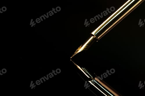 Preview: Close up of a pen on black background