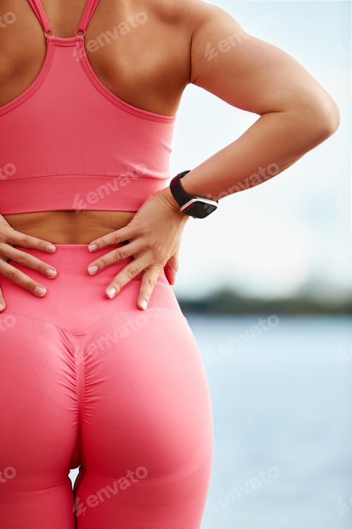 Preview: Young beautiful woman with a slim figure goes in for sports at beach. Fitness, sport and healthy