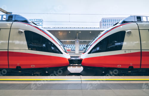 Preview: High speed train in motion on the railway station at sunset