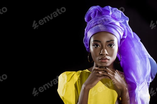 Preview: young african american woman in stylish vintage clothing isolated on black