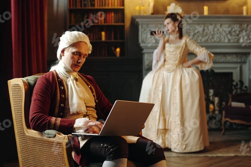 Preview: Caucasian Middle Aged Man Using Laptop While Woman Standing in Baroque Room