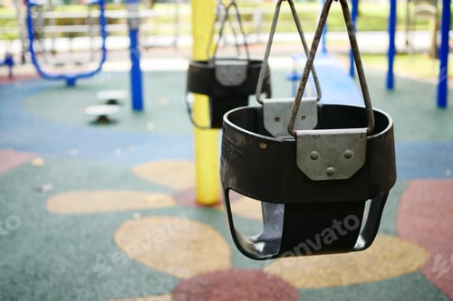 Preview: Close-up of a baby swing in the playground