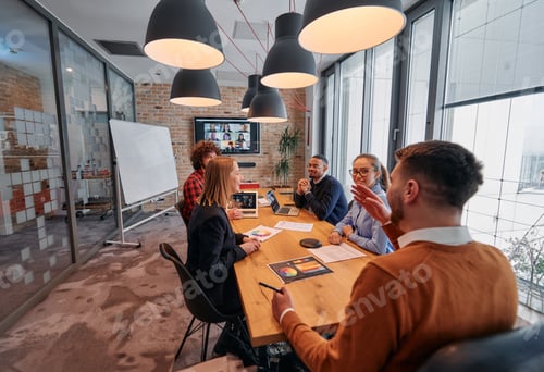 Preview: In the vibrant ambiance of a modern startup office, a diverse team of business professionals engage