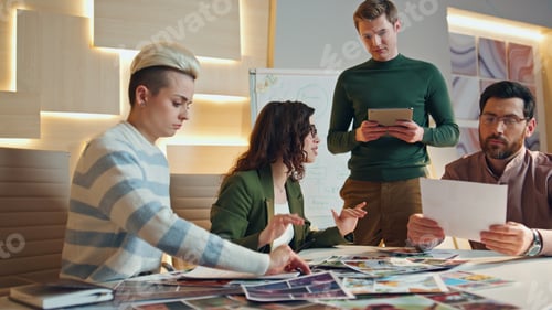 Preview: Creative young team brainstorm on business project at meeting. Group discussing