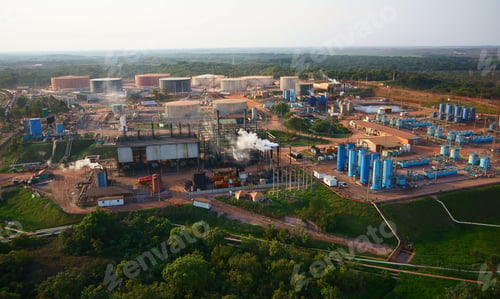 Preview: Aerial shot of modern factory complex in an industrial area in the daylight.