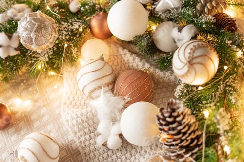 Preview: Christmas bedroom decor: Christmas balls, fir branches, garlands, cotton.