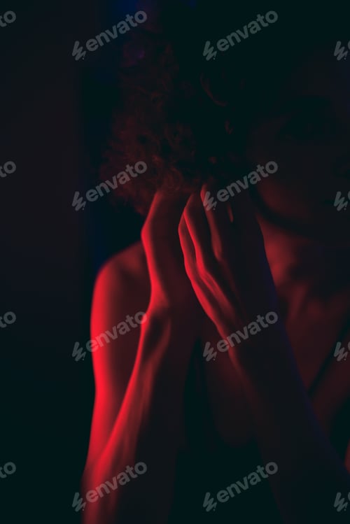 Preview: Woman covering her face with her hands